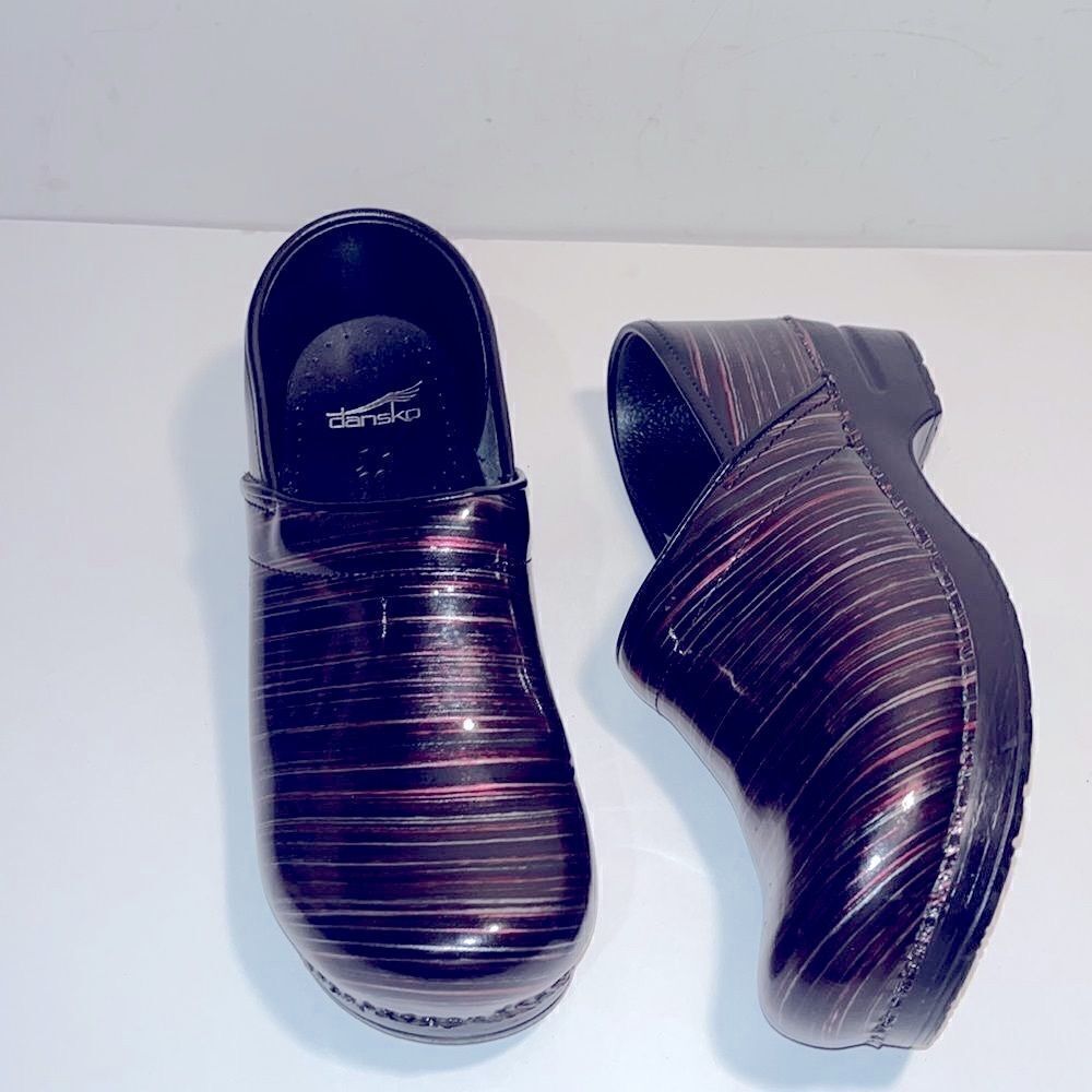 Dansko leather multicolored striped clogs in excellent like new condition.